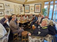 several motley crews enjoying a pint in The Ferry Boat Inn